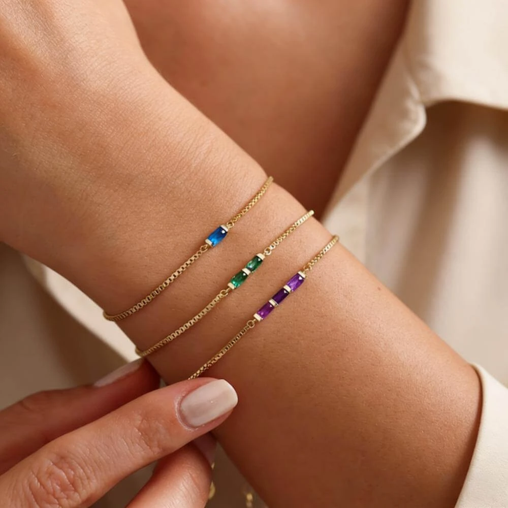 AI-generated birthstone bracelet image on a model’s wrist, clearly showing the stones and colors.