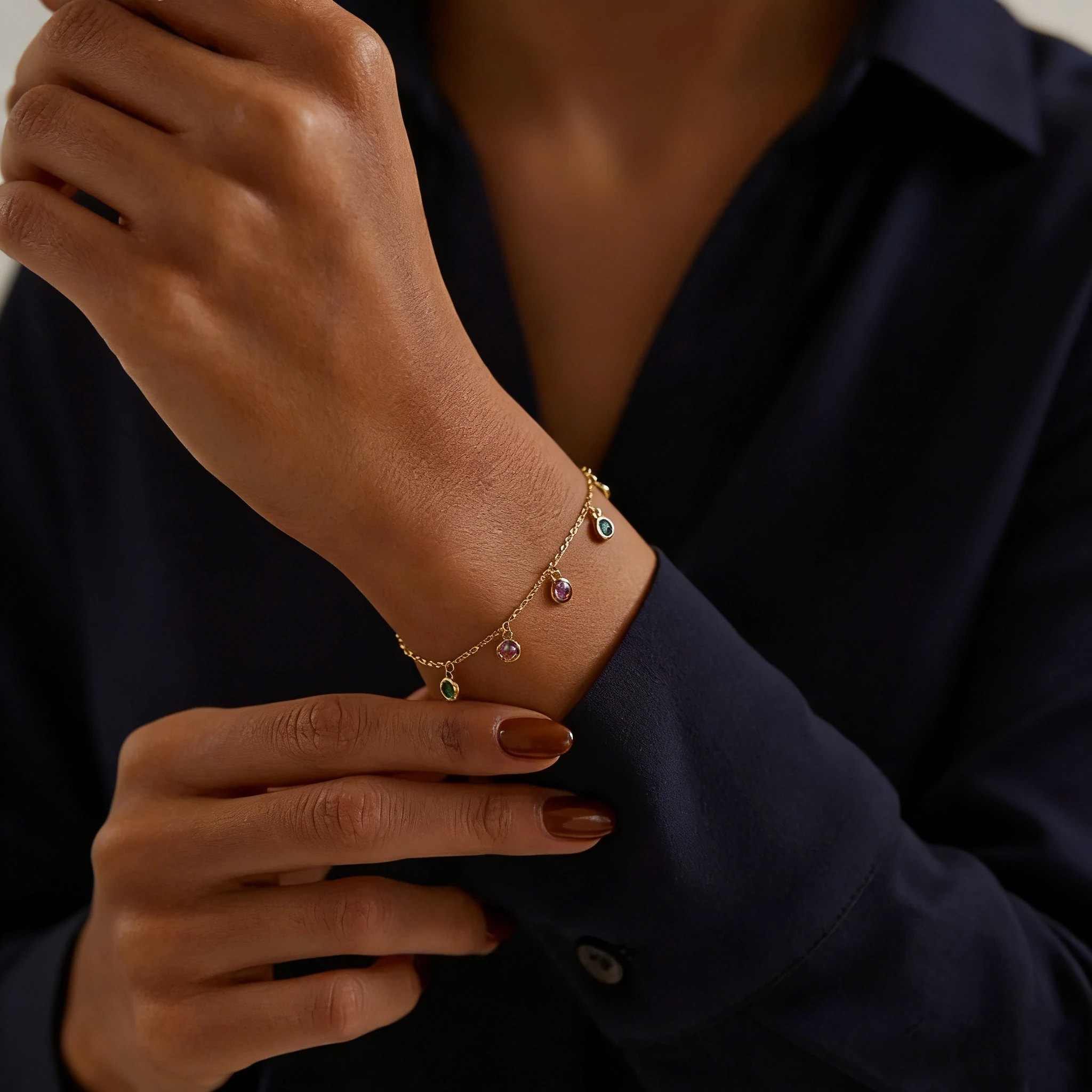 AI-generated charm bracelet image on a model’s wrist where every charm is visible and the bracelet looks neat, not cluttered.