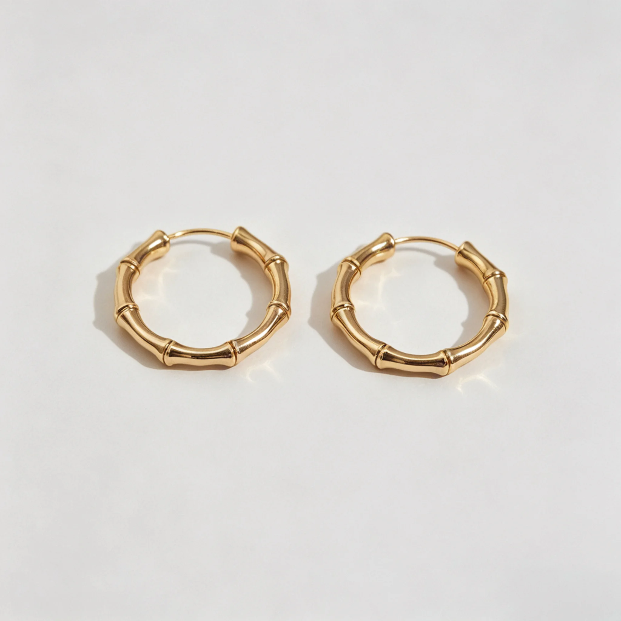 classic gold bamboo hoops with segmented detail