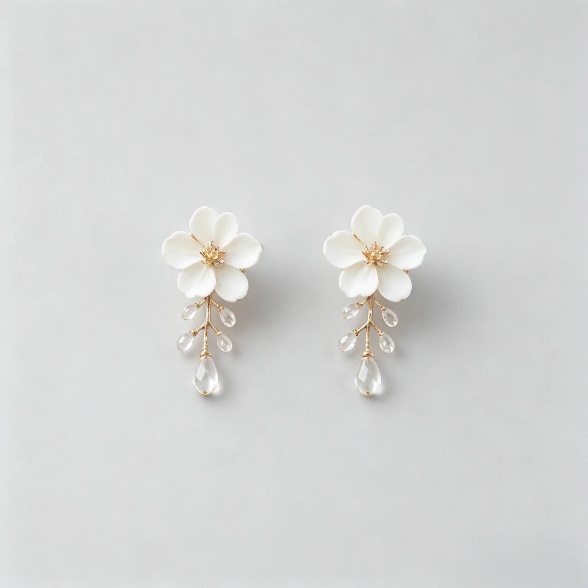 Floral bridal earrings product photo with petal and leaf detail