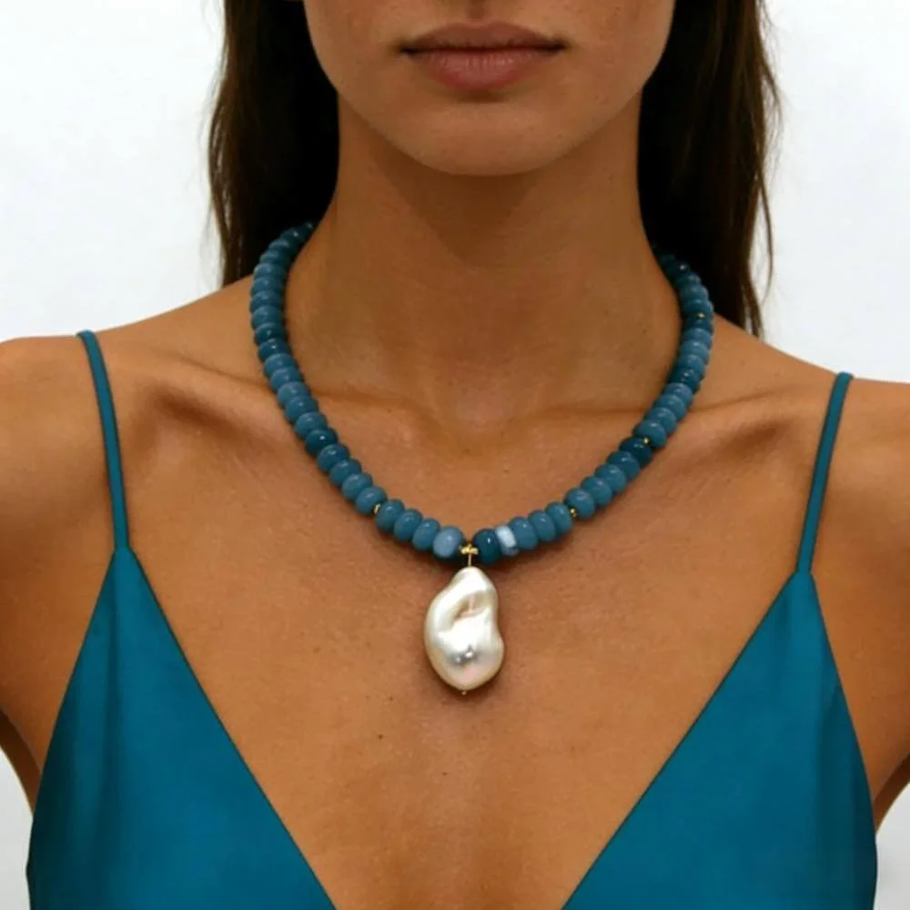gemstone necklace on model showing color and pendant size