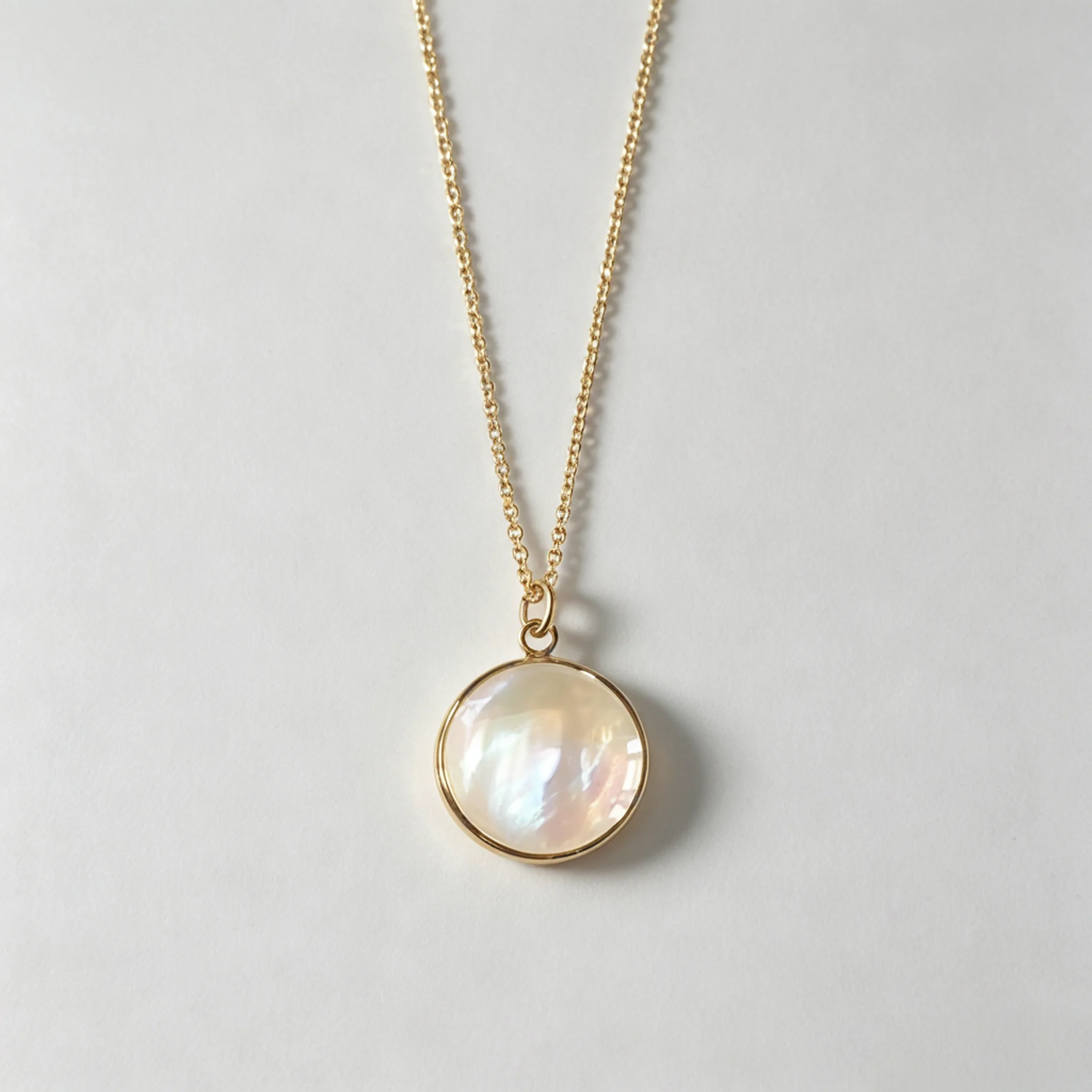 Pearl pendant necklace photographed with a single pearl focal point
