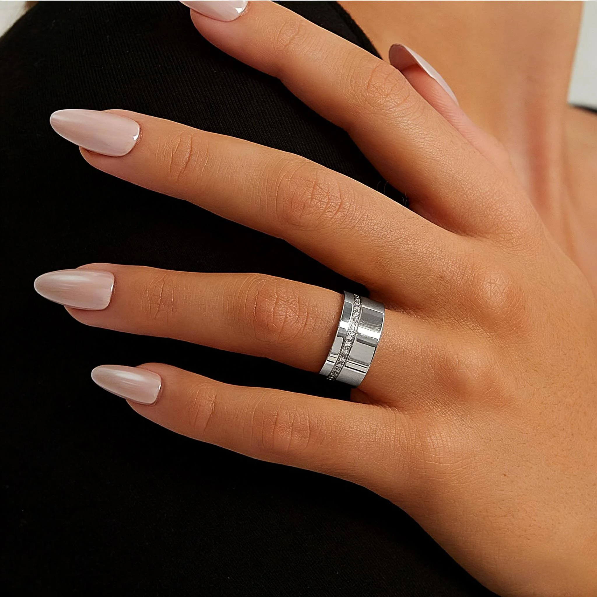 Statement ring on-hand hero example emphasizing bold presence, readable silhouette, and a believable size reference.